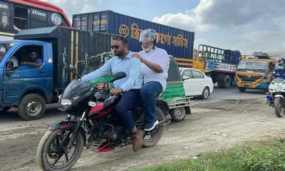 ঢাকা-সিলেট মহাসড়ক পরিদর্শনে গিয়ে যানজটে নিজেই আটকা, গাড়ি ছেড়ে মোটরসাইকেলে উপদেষ্টা