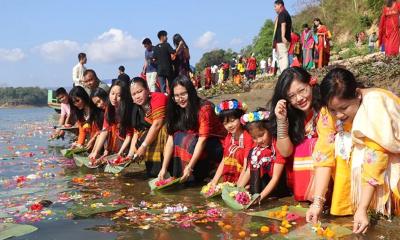 নদীতে ফুল ভাসিয়ে বিজু উৎসব শুরু